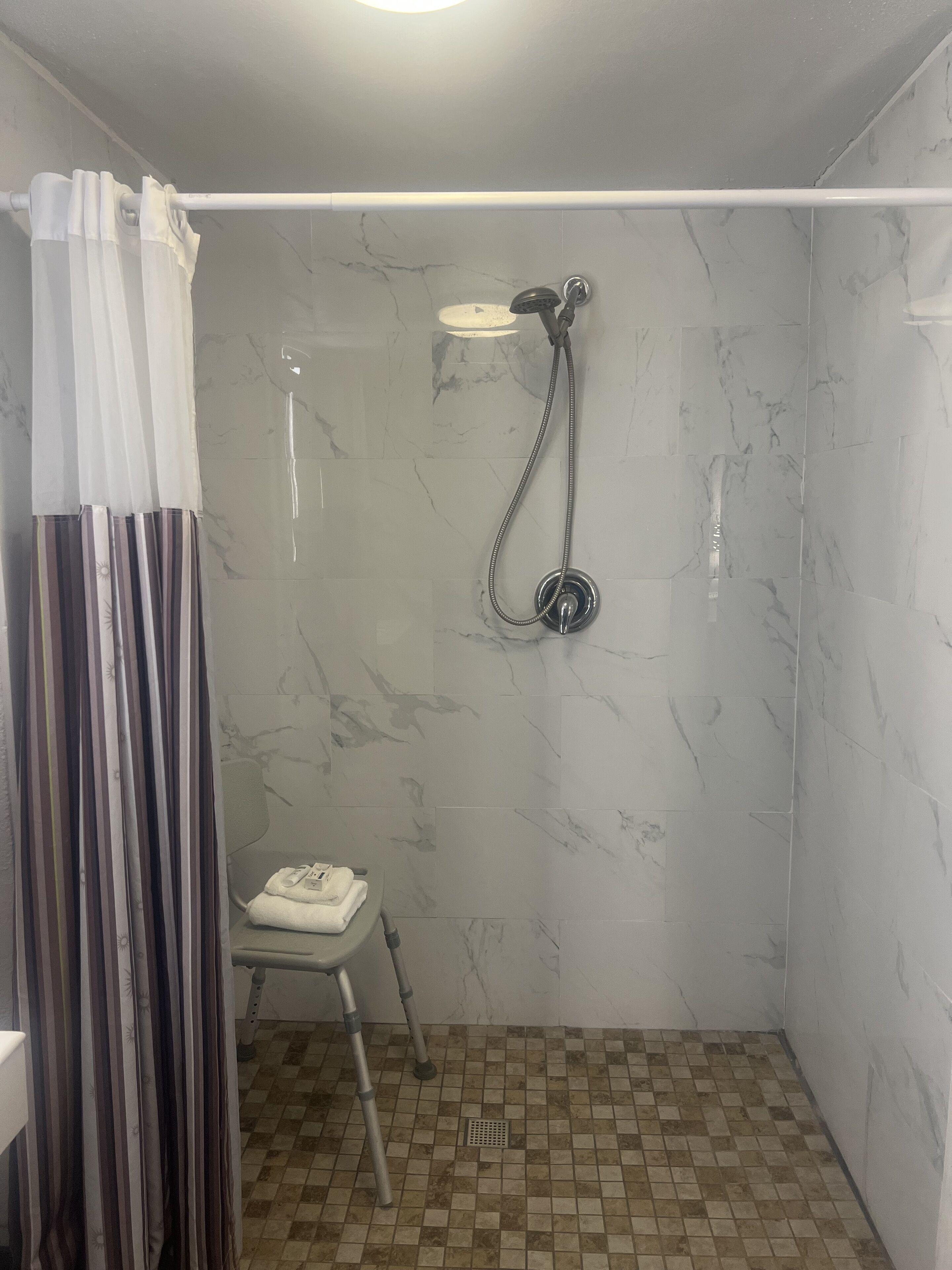 Double Room Two Double Beds Roll Shower Courtyard View Mobility Accessible or Non-Smoking